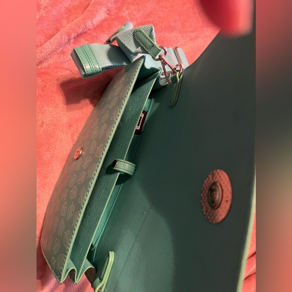 Animal Crossing Nintendo Switch Lite case. Never used, with strap. - Picture 7 of 10